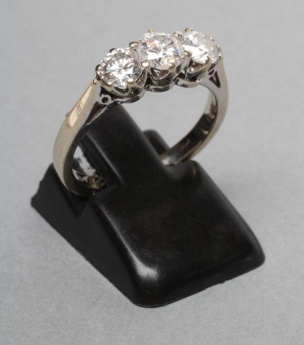 A THREE STONE DIAMOND RING Image
