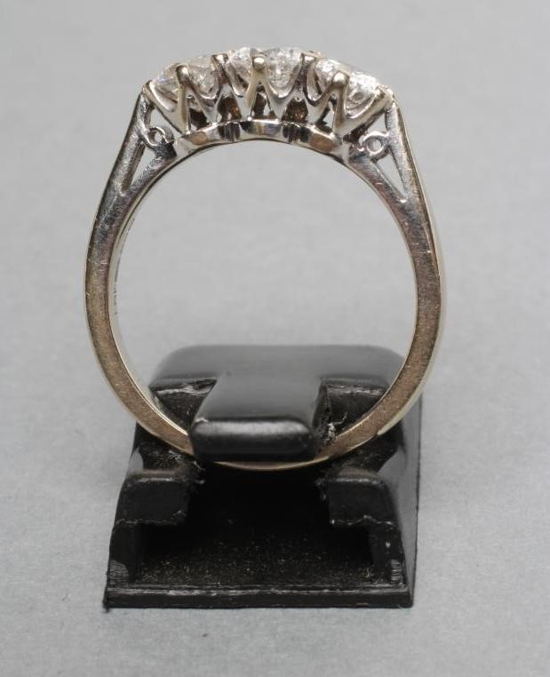 A THREE STONE DIAMOND RING Image