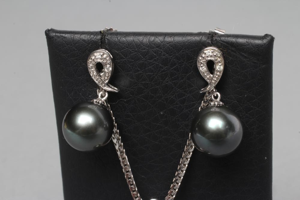 A TAHITIAN PEARL AND DIAMOND PENDANT Image