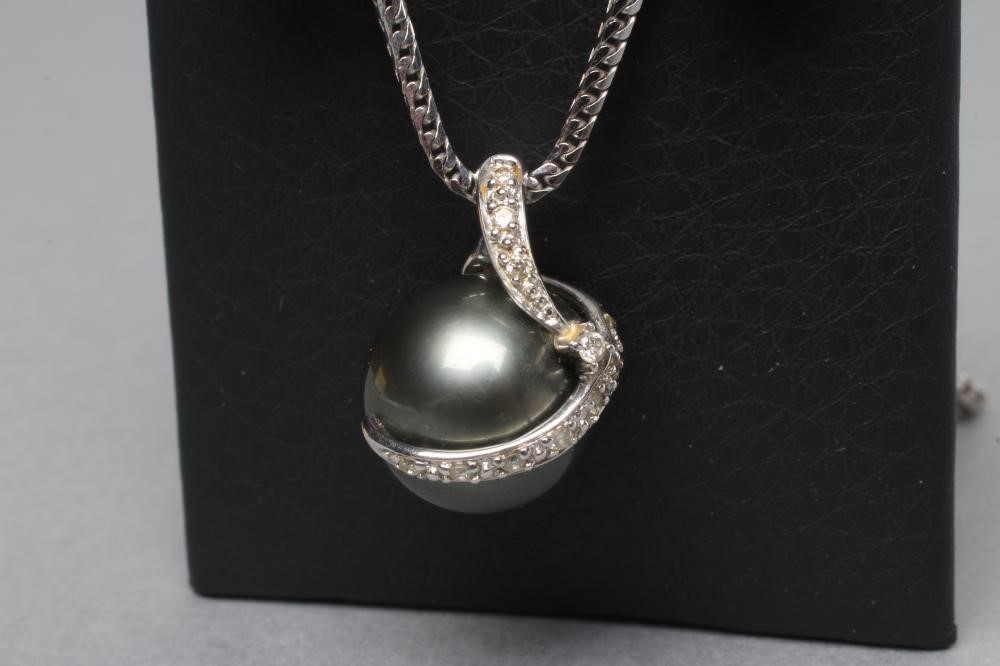 A TAHITIAN PEARL AND DIAMOND PENDANT Image