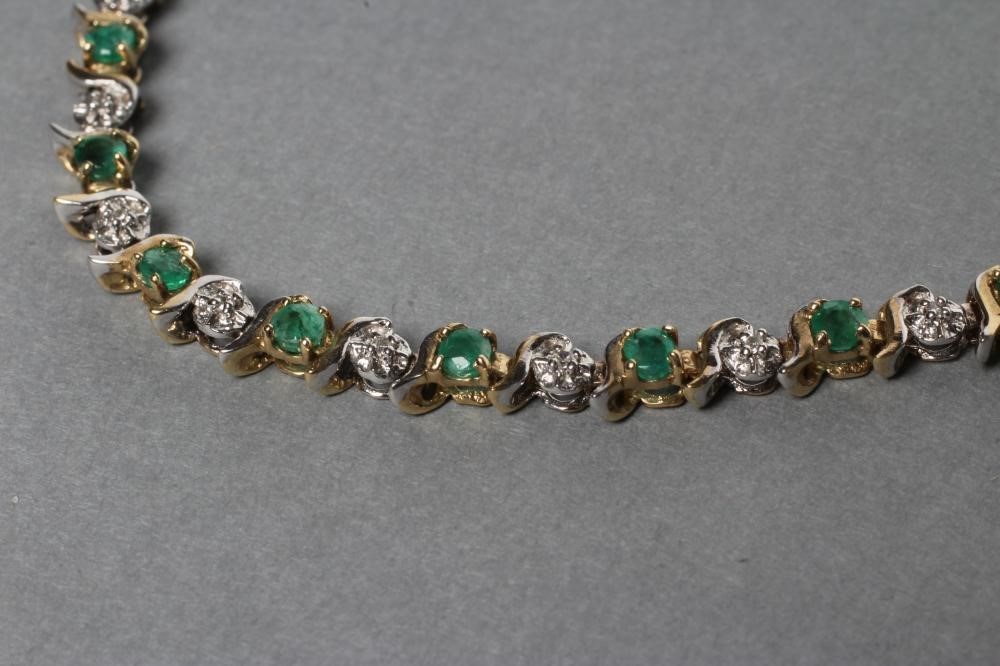 AN EMERALD AND DIAMOND BRACELET claw set with twenty two emeralds and twenty one diamond points with Image