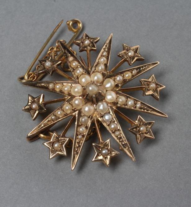 AN EDWARDIAN 9CT GOLD STAR BROOCH Image