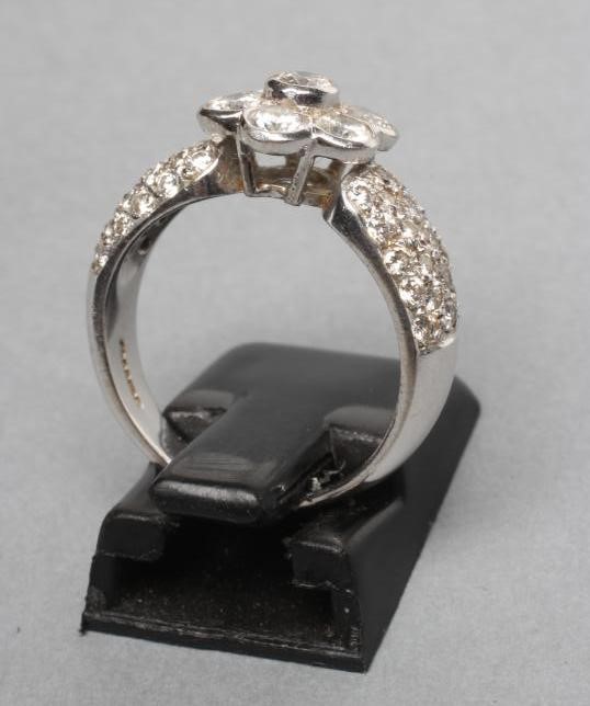 A DIAMOND CLUSTER RING Image