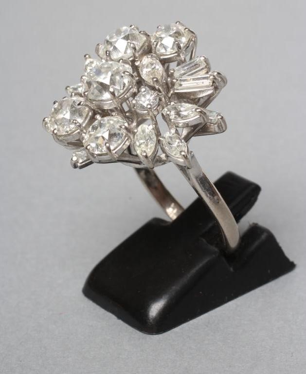 A DIAMOND CLUSTER RING Image