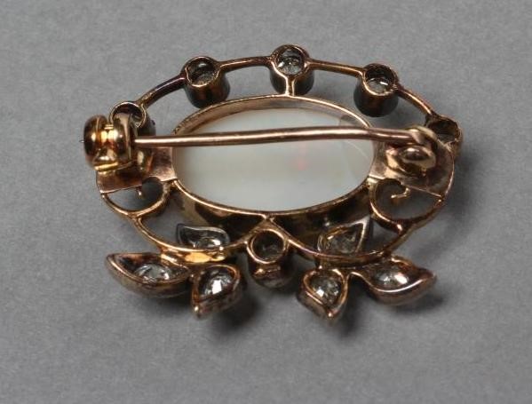AN OPAL AND DIAMOND BROOCH Image