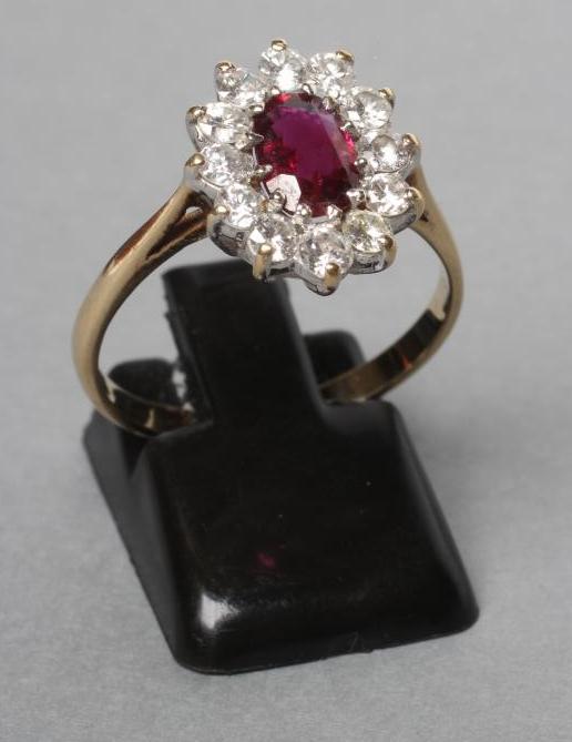 A RUBY AND DIAMOND CLUSTER RING Image