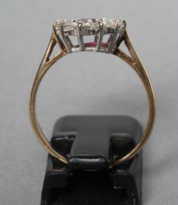 A RUBY AND DIAMOND CLUSTER RING Image
