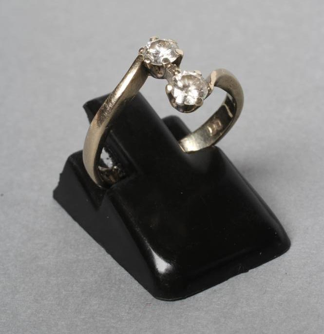 A TWO STONE DIAMOND RING Image