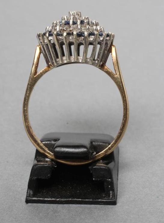 A SAPPHIRE AND DIAMOND BOSS RING Image