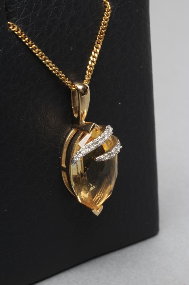 A CITRINE PENDANT similar to the previous lot Image