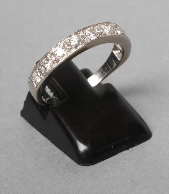 A DIAMOND HALF HOOP ETERNITY RING Image