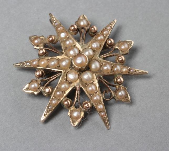 AN EDWARDIAN SEED PEARL STAR BROOCH/PENDANT Image
