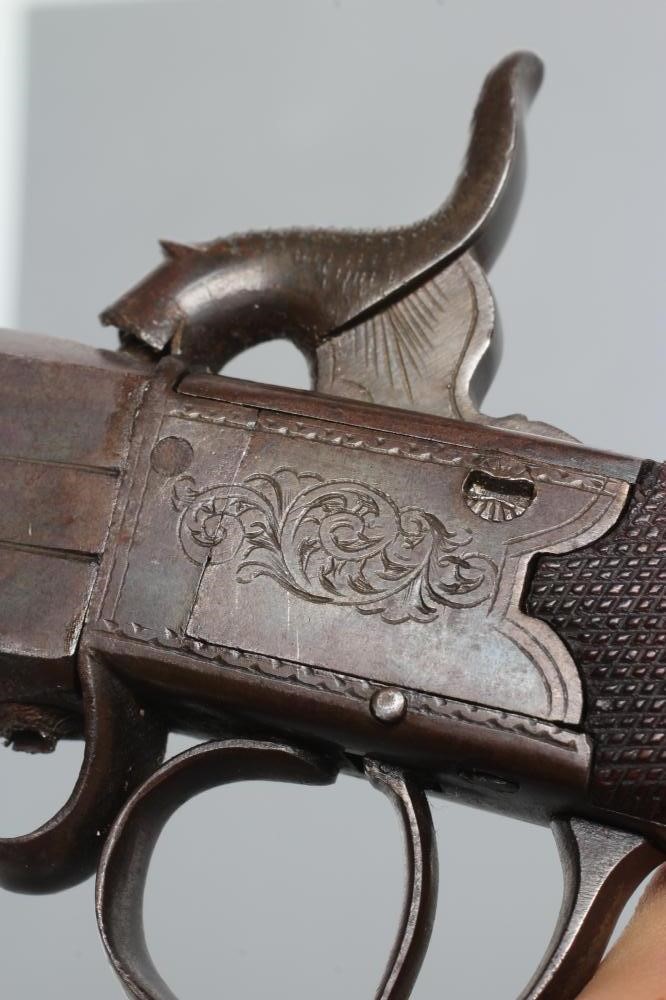 A PERCUSSION OVER & UNDER DOUBLE BARRELLED PISTOL Image