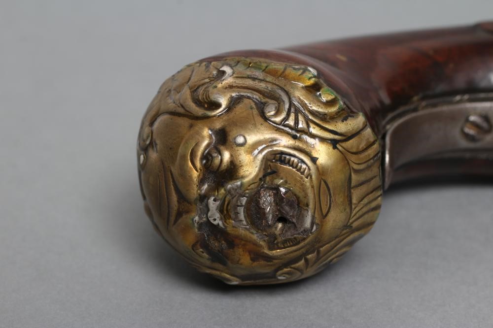 A QUEEN ANNE PISTOL Image