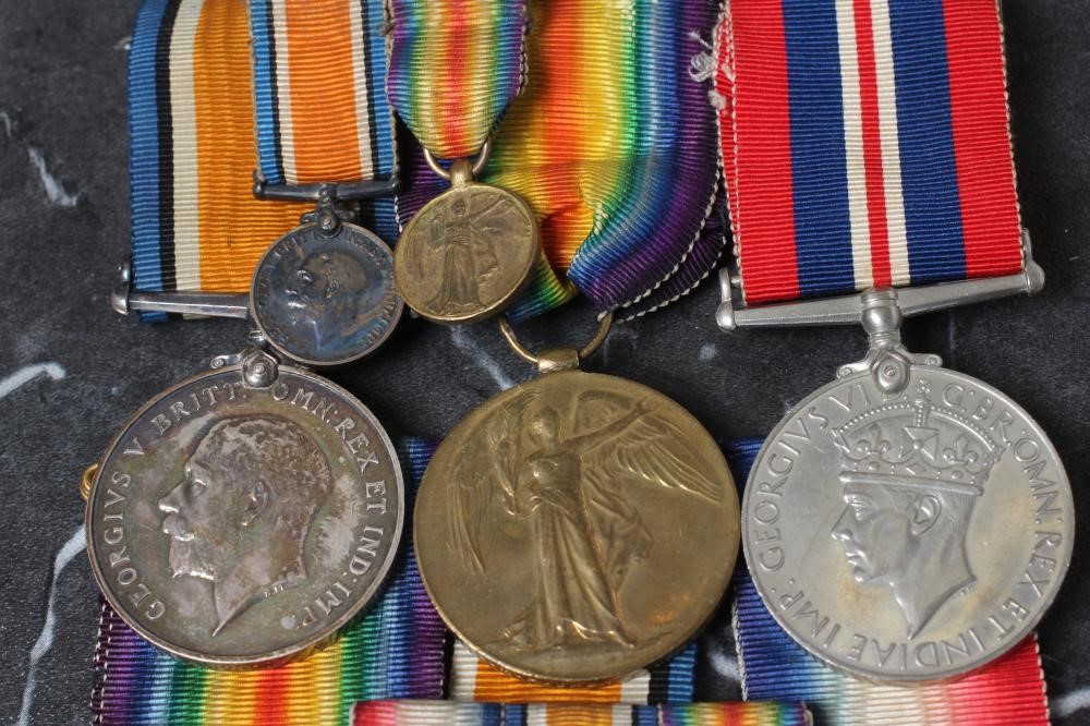 TWO GROUPS OF FIRST & SECOND WORLD WAR MEDALS AWARDED TO TWO FAMILY MEMBERS Image