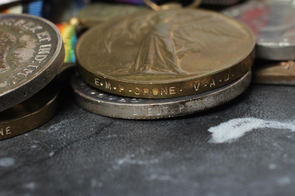 TWO GROUPS OF FIRST & SECOND WORLD WAR MEDALS AWARDED TO TWO FAMILY MEMBERS Image