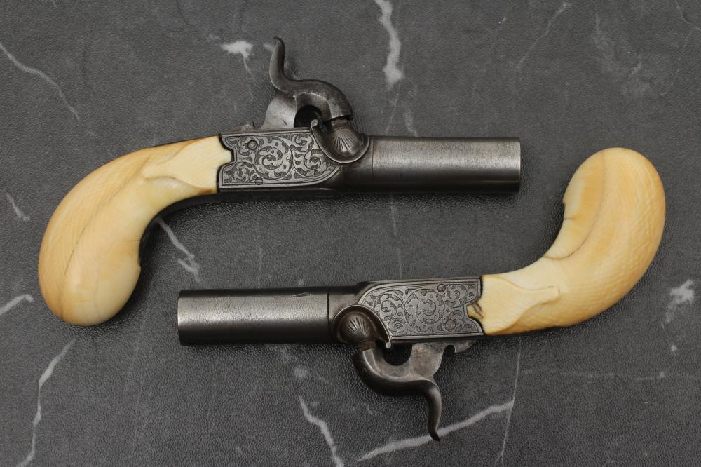 A PAIR OF BELGIAN PERCUSSION POCKET PISTOLS Image