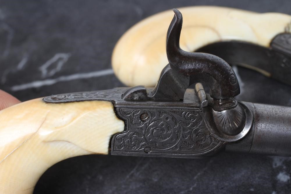 A PAIR OF BELGIAN PERCUSSION POCKET PISTOLS Image