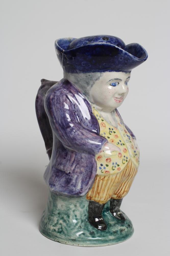 A MAK MERRY EARTHENWARE TOBY JUG AND COVER Image