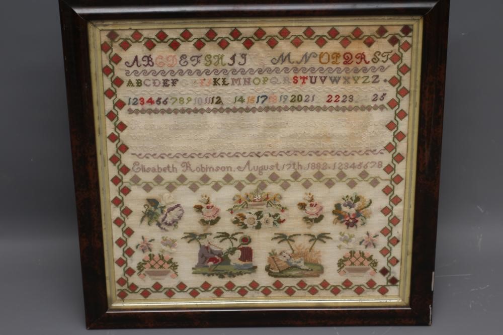 A VICTORIAN WOOLWORK SAMPLER Image