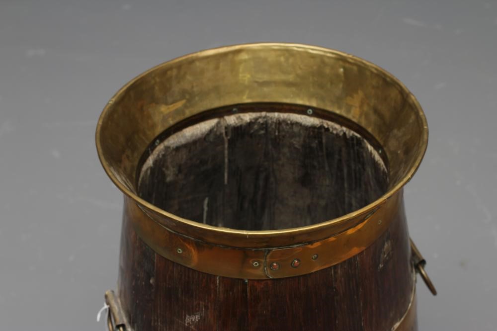 A COOPERED OAK BARREL SHAPED STICK STAND Image