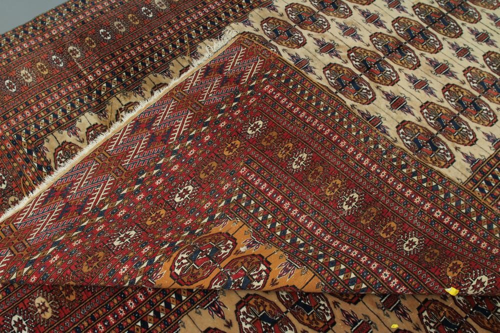A PAIR OF BOKHARA DESIGN RUGS Image