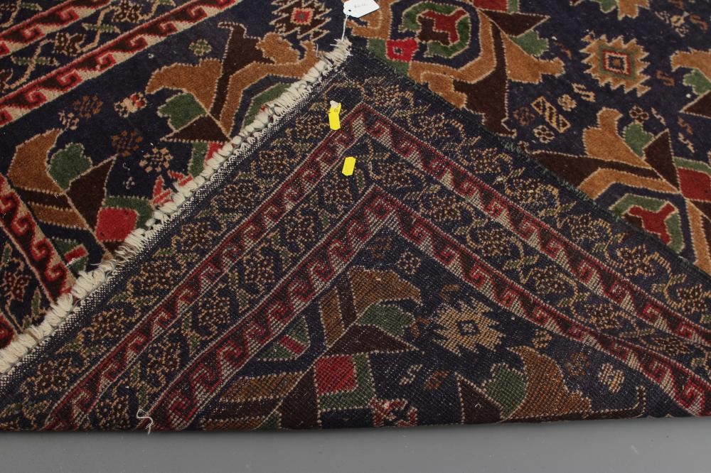 A PERSIAN TRIBAL RUG Image