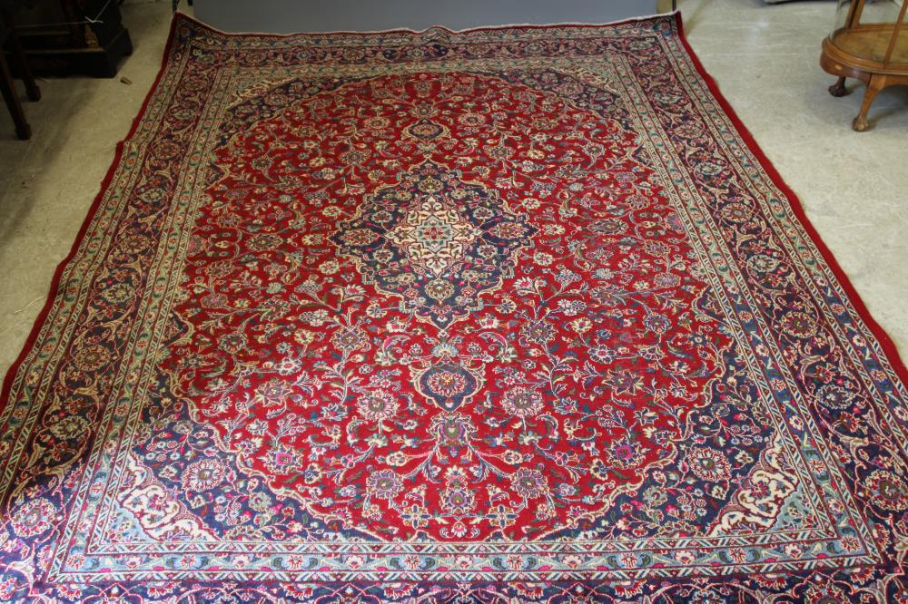 A PERSIAN STYLE WOOL CARPET Image