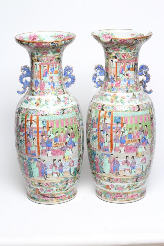 A PAIR OF CANTONESE PORCELAIN VASES of cylindrical form with waisted necks and scroll pierced Image