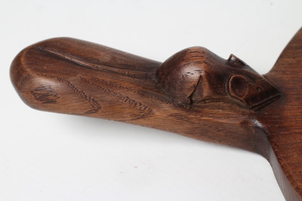 A ROBERT THOMPSON ADZED OAK CHEESE BOARD Image