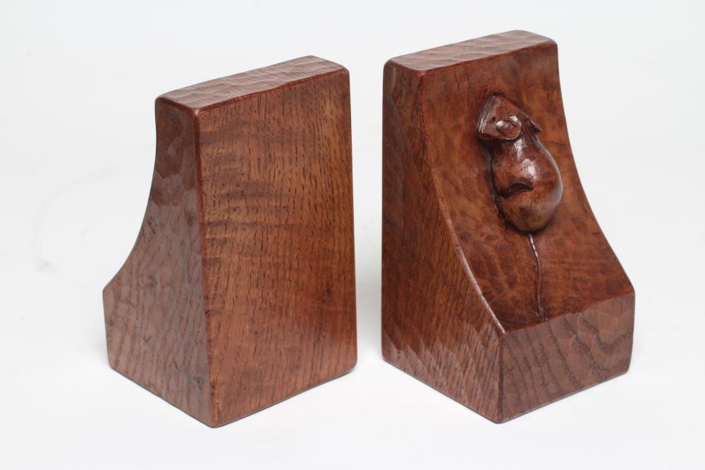 A PAIR OF ROBERT THOMPSON ADZED OAK BOOKENDS of square form Image
