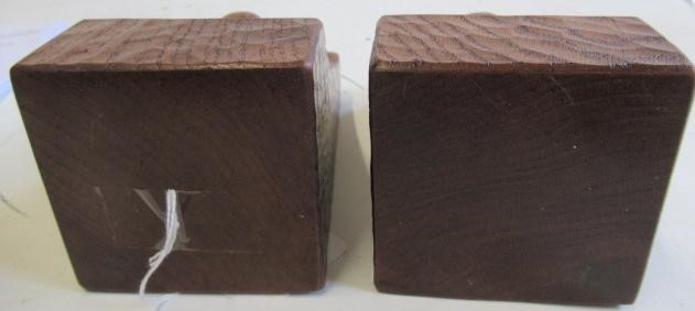 A PAIR OF ROBERT THOMPSON ADZED OAK BOOKENDS of square form Image