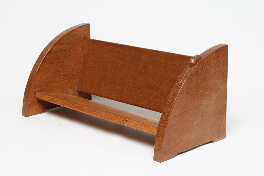 A ROBERT THOMPSON ADZED OAK BOOK TROUGH Image