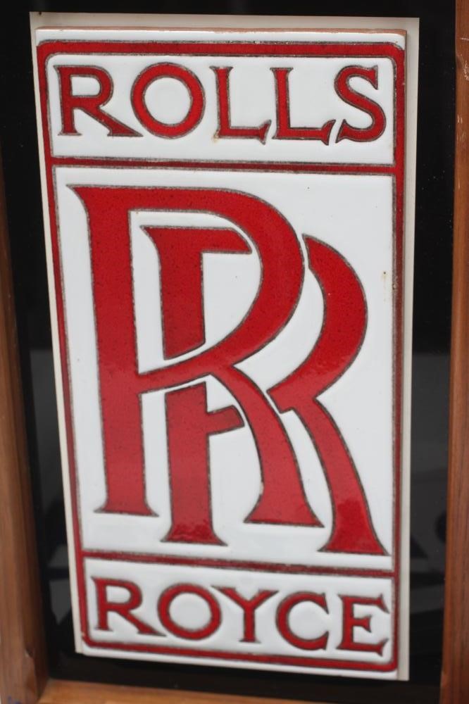 TWO FRAMED CERAMIC ROLLS ROYCE LOGOS Image