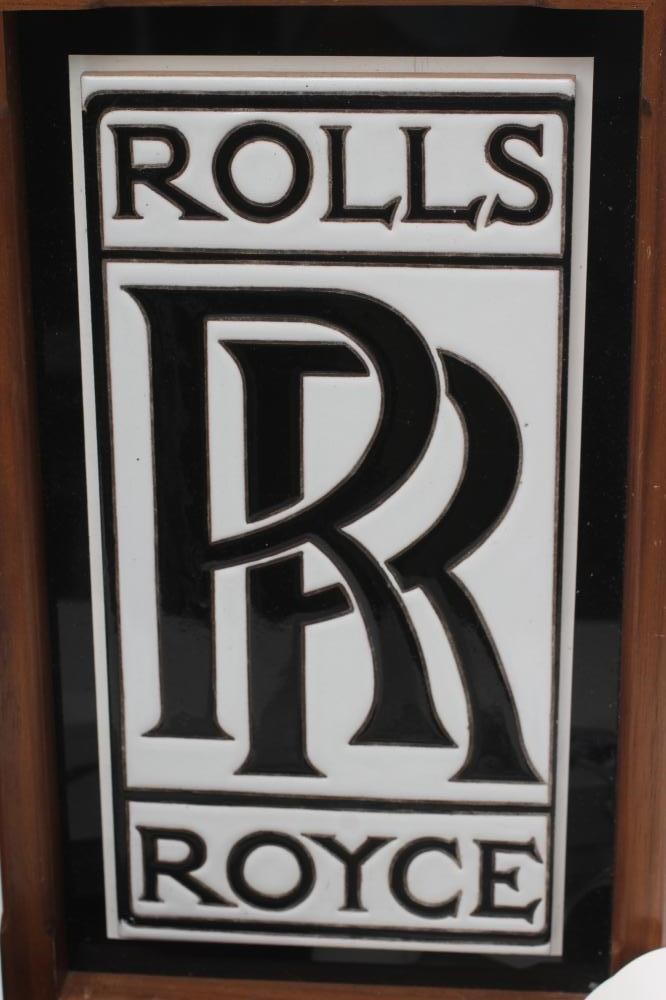 TWO FRAMED CERAMIC ROLLS ROYCE LOGOS Image
