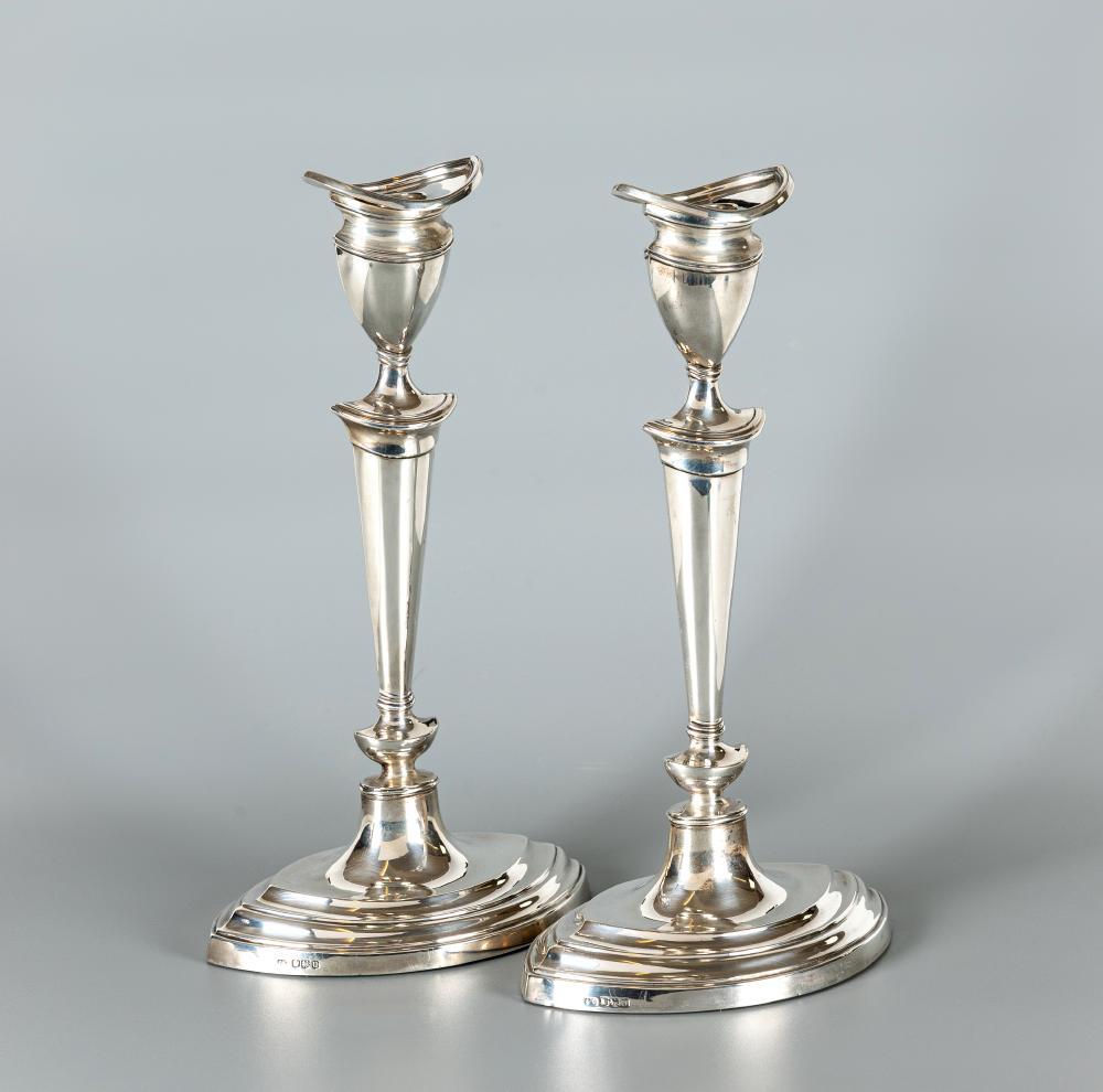 A PAIR OF CANDLESTICKS Image