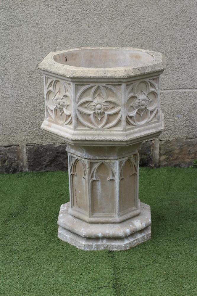 A COMPOSITION STONE PLANTER of octagonal form Image