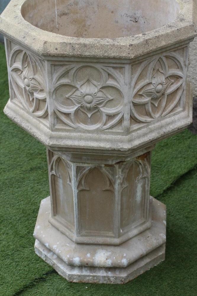 A COMPOSITION STONE PLANTER of octagonal form Image