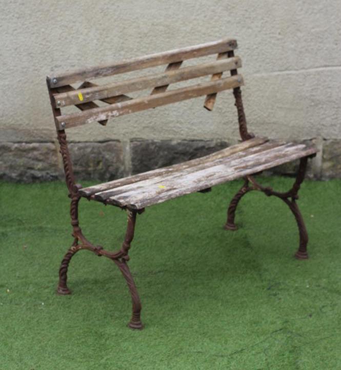 A SMALL VICTORIAN CAST IRON BENCH Image