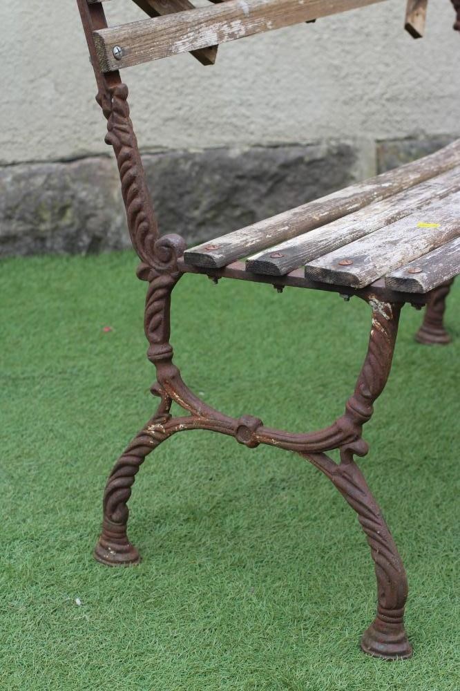 A SMALL VICTORIAN CAST IRON BENCH Image