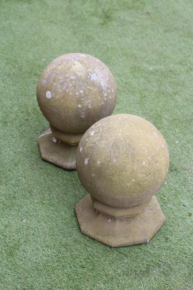 A PAIR OF SANDSTONE GATEPOST BALL FINIALS Image