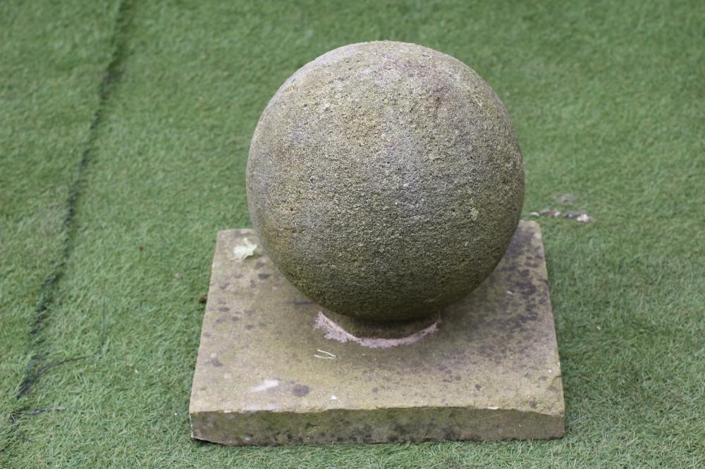 A PAIR OF SANDSTONE GATEPOST BALL FINIALS Image