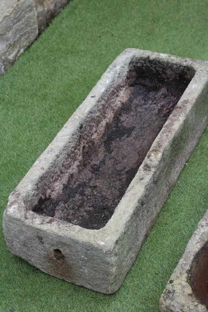 A SANDSTONE TROUGH of narrow oblong form Image