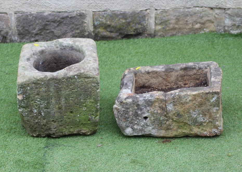 A SMALL SANDSTONE TROUGH of irregular rough hewn oblong form Image
