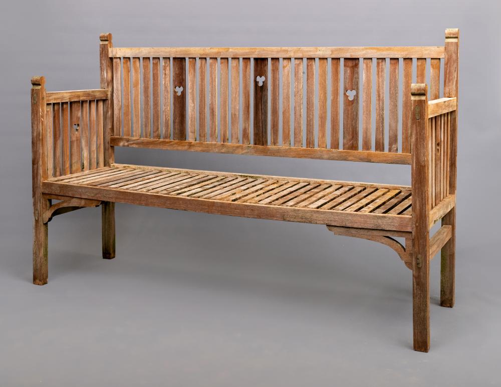 AN ARTS AND CRAFTS STYLE TEAK BENCH Image