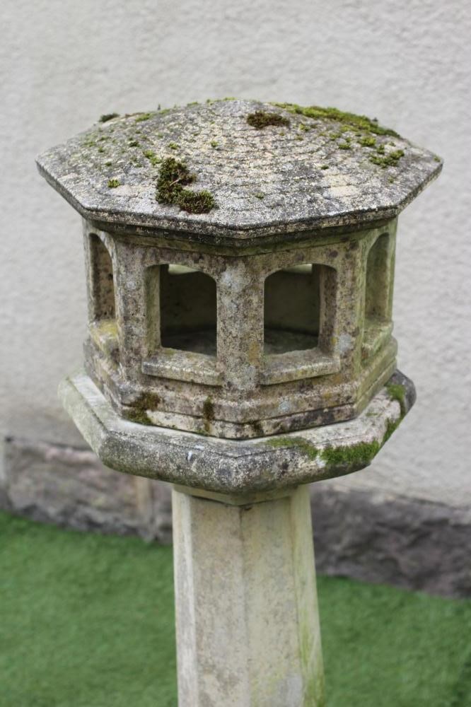 A COMPOSITION STONE BIRD FEEDER Image