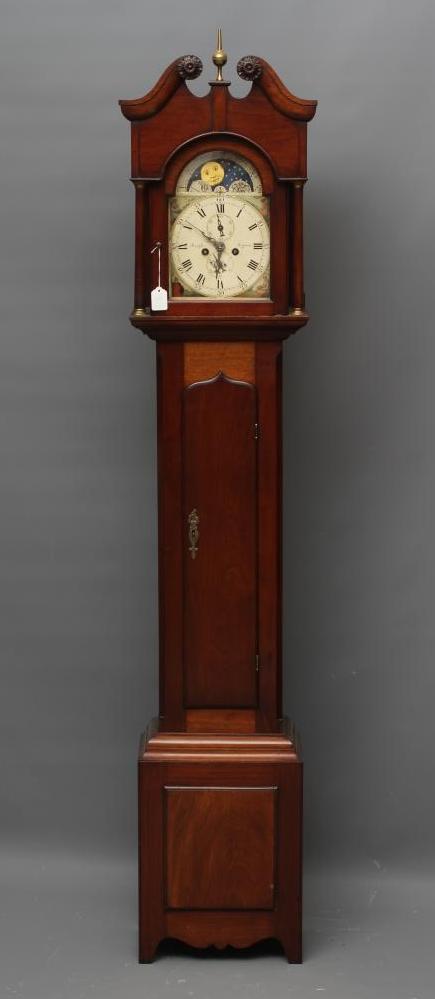 A SMALL MAHOGANY LONGCASE CLOCK Image