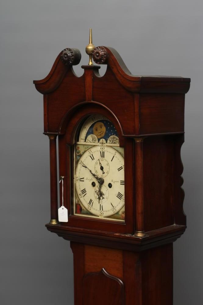 A SMALL MAHOGANY LONGCASE CLOCK Image