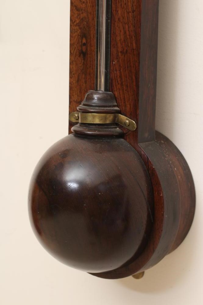 A ROSEWOOD STICK BAROMETER Image