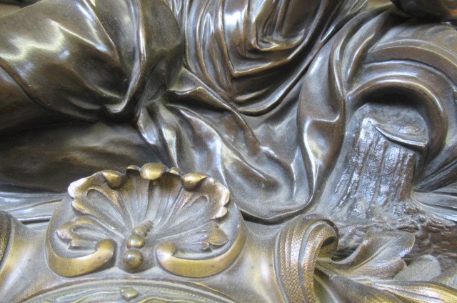 A FRENCH PATINATED AND GILT BRONZE MANTEL CLOCK Image